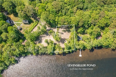 Build-ready waterfront lot on beautiful Levenseller Pond! This - photo 3