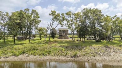 Experience riverfront living with this unique, fully furnished - photo 27