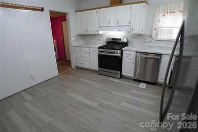 Charming corner-lot home featuring 2 bedrooms and 2 full baths - photo 31