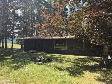 Enjoy waterfront living with this 3-bedroom, 2-bath home - photo 1