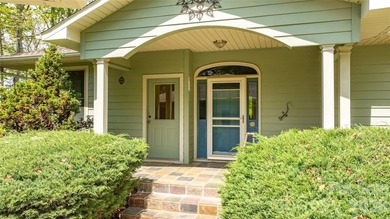 Tucked within a desirable lake community, this thoughtfully - photo 2