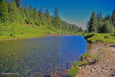 Set along 290 feet of private Upper Pack River frontage on over - photo 3