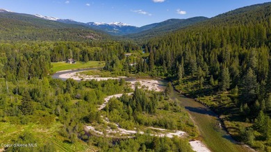 Set along 290 feet of private Upper Pack River frontage on over - photo 4