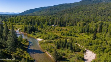 Set along 290 feet of private Upper Pack River frontage on over - photo 5