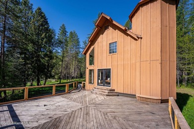 Set along 290 feet of private Upper Pack River frontage on over - photo 9