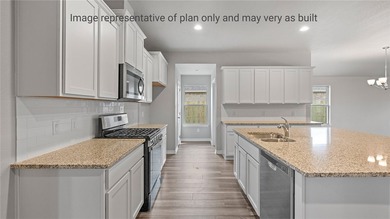 The Kingston plan is a single-story, 4-bedroom, 2-bathroom home - photo 14