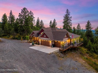 Stunning sunsets frame this custom designed Craftsman that sits - photo 4