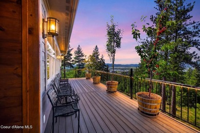 Stunning sunsets frame this custom designed Craftsman that sits - photo 8