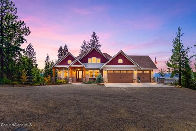 Stunning sunsets frame this custom designed Craftsman that sits - photo 9