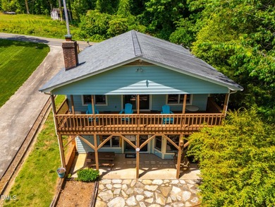 This WATERFRONT retreat on beautiful Badin Lake is the perfect - photo 3