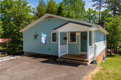 This WATERFRONT retreat on beautiful Badin Lake is the perfect - photo 4