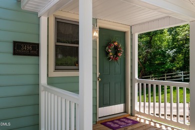 This WATERFRONT retreat on beautiful Badin Lake is the perfect - photo 5