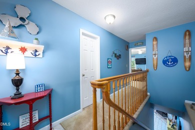 This WATERFRONT retreat on beautiful Badin Lake is the perfect - photo 6