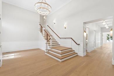 Set on a private peninsula with 600 feet of waterfront, this - photo 7
