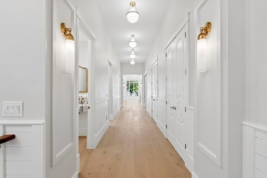 Set on a private peninsula with 600 feet of waterfront, this - photo 8