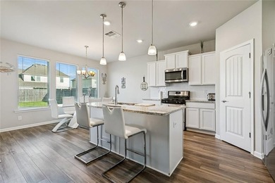 Welcome home to this modern Acadian-style construction, open - photo 8