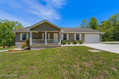 Experience the best of lakefront living with this charming 3 bed - Lake Home For Sale in Speedwell, Tennessee