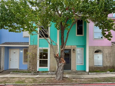 Welcome to this beautifully maintained 2-bedroom, 1.5-bath condo - photo 1