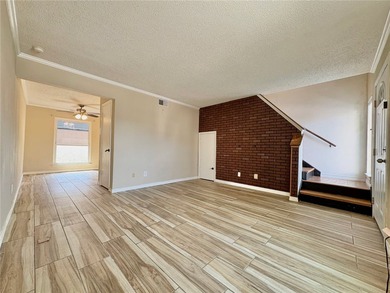 Welcome to this beautifully maintained 2-bedroom, 1.5-bath condo - photo 2