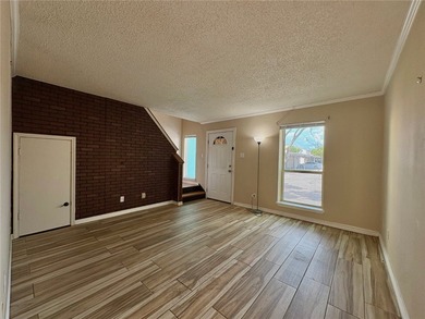 Welcome to this beautifully maintained 2-bedroom, 1.5-bath condo - photo 3