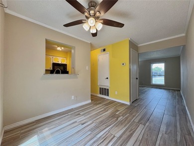 Welcome to this beautifully maintained 2-bedroom, 1.5-bath condo - photo 4