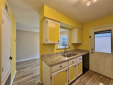 Welcome to this beautifully maintained 2-bedroom, 1.5-bath condo - photo 6