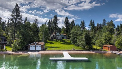 Privately gated on 3.81 acres of coveted Finley Point, this - photo 2