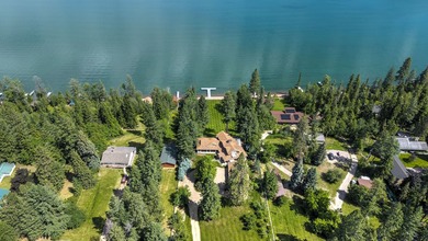 Privately gated on 3.81 acres of coveted Finley Point, this - photo 7