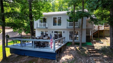 Classic cabin vibes can be found at the 44 mile marker at the - Lake Home For Sale in Roach, Missouri