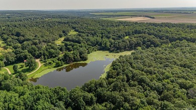 56.86 -ACRE SELF-SUSTAINING COMPOUND WITH PRIVATE LAKE, BARNS & - photo 48