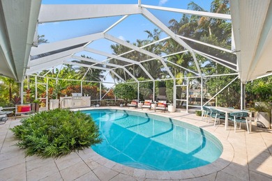 Set along 177' of maturely landscaped wide waterfront, 2124 - photo 19