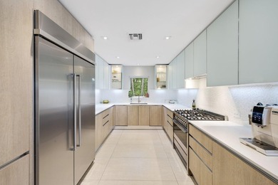 Set along 177' of maturely landscaped wide waterfront, 2124 - photo 20