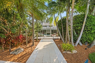Set along 177' of maturely landscaped wide waterfront, 2124 - photo 26