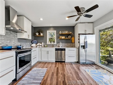 Great Lake View and nice open Decks with a Hot Tub! Vaulted - photo 19