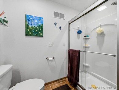 Great Lake View and nice open Decks with a Hot Tub! Vaulted - photo 25