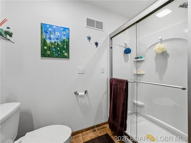 Great Lake View and nice open Decks with a Hot Tub! Vaulted - photo 25
