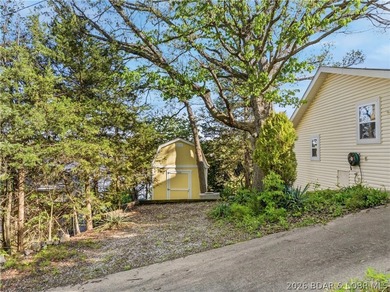 Great Lake View and nice open Decks with a Hot Tub! Vaulted - photo 35