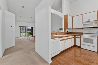 A MUST-See! This charming NEW 2025 ROOF and lakefront villa is - photo 12