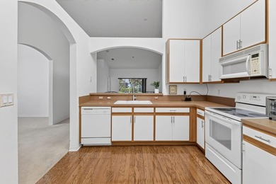 A MUST-See! This charming NEW 2025 ROOF and lakefront villa is - photo 22