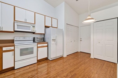 A MUST-See! This charming NEW 2025 ROOF and lakefront villa is - photo 23