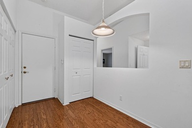 A MUST-See! This charming NEW 2025 ROOF and lakefront villa is - photo 24