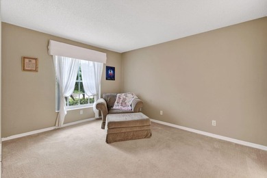 A MUST-See! This charming NEW 2025 ROOF and lakefront villa is - photo 37