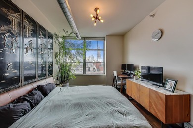 Rarely available West Loop Penthouse at The Metro with