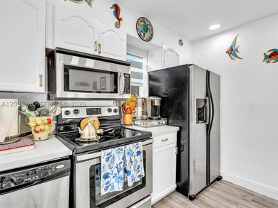 Welcome to this charming 2-bedroom, 1.5-bath townhouse located - photo 13