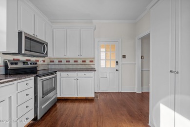 Step into timeless charm with this beautifully updated historic - photo 18