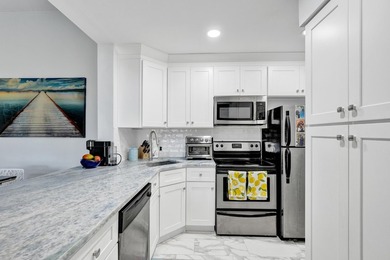 WATERFRONT LIVING WITH EXCEPTIONAL BUYER SAVINGS! Move right - photo 6