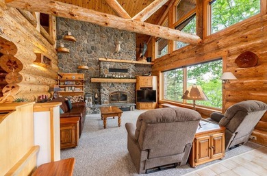 Set on 193 feet of private Bluewater Lake shoreline with - photo 11