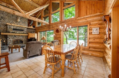 Set on 193 feet of private Bluewater Lake shoreline with - photo 12