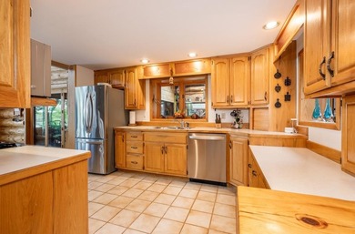 Set on 193 feet of private Bluewater Lake shoreline with - photo 18