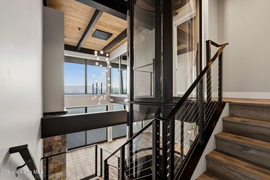 Welcome to the exquisite TOP floor 2-story penthouse at Building - photo 19